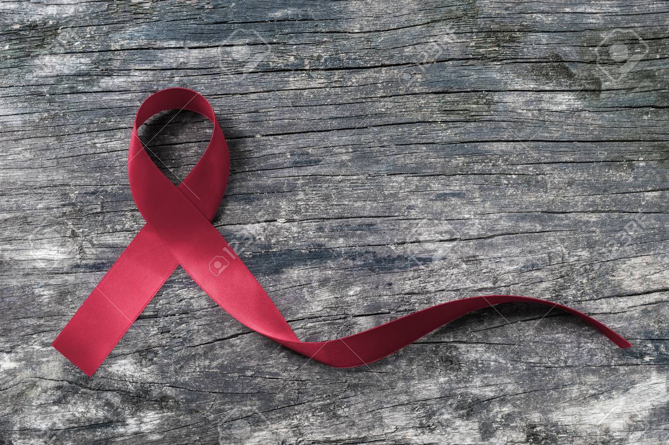 Burgundy Ribbon For Multiple Myeloma MM Cancer And Sickle-Cell Anemia  Awareness On Old Aged Wood Background Stock Photo, Picture and Royalty Free  Image. Image 116071001., image size:1300x866