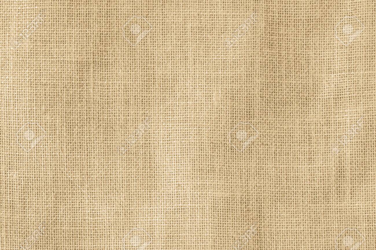 Hessian sackcloth woven texture pattern background in light cream yellow beige earth tone color - 131548915 Hessian sackcloth woven texture pattern background in light cream yellow beige earth tone color - 131548915