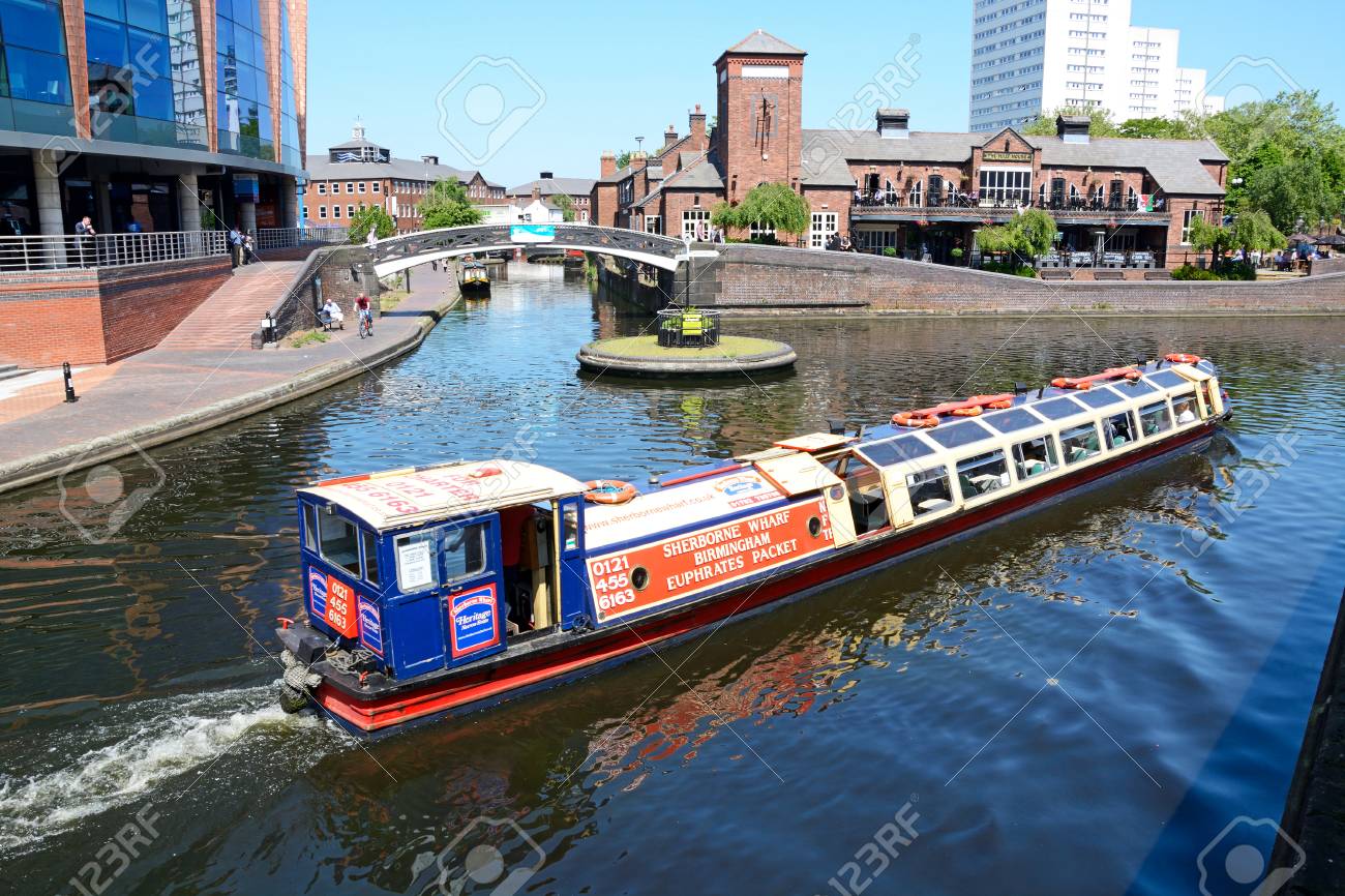 View Of The Malt House Pub At Old Turn Junction With A Tour Boat