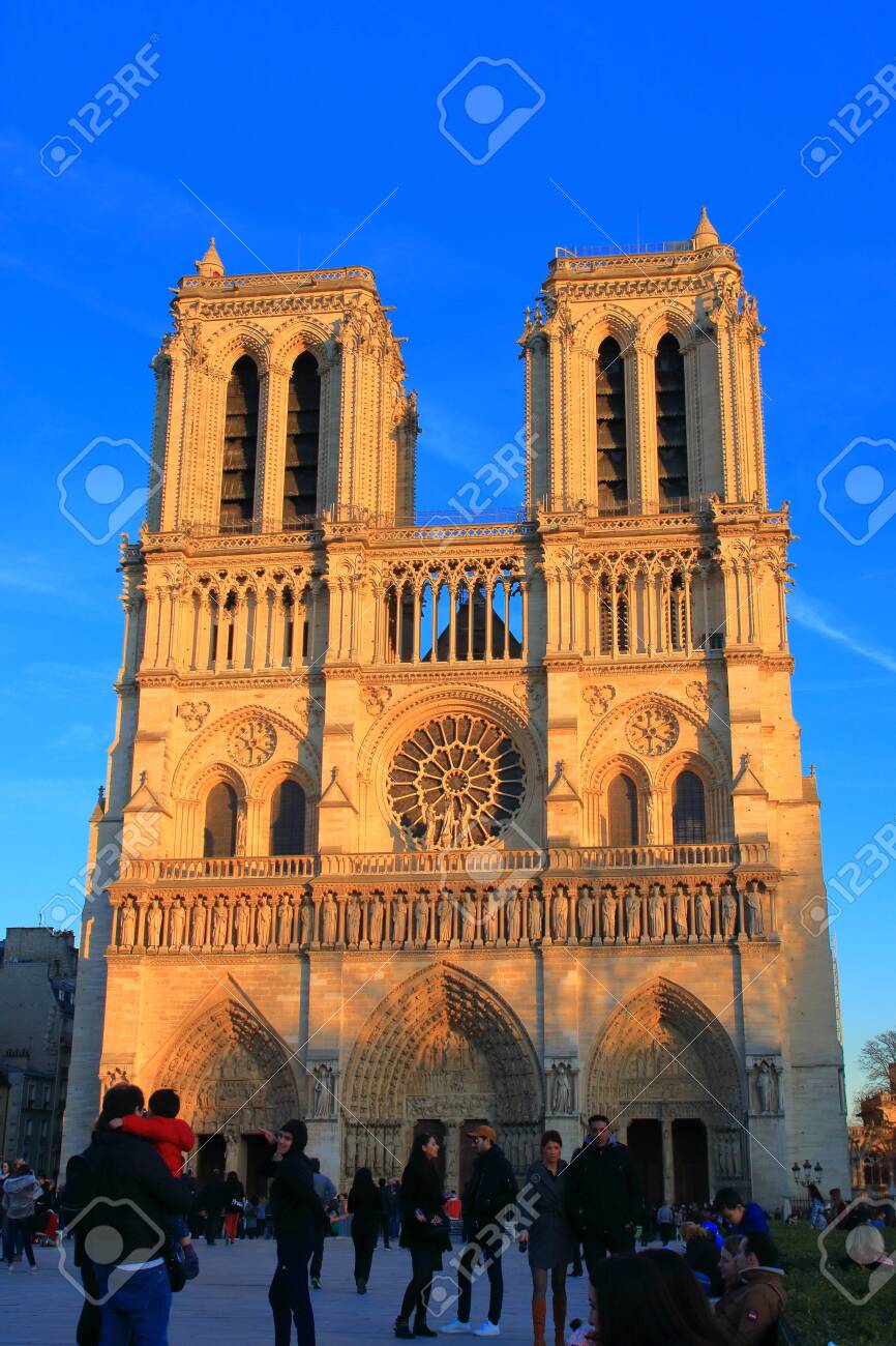 Notre Dame Cathedral in Paris and visiting tourists , France - 122540124 Notre Dame Cathedral in Paris and visiting tourists , France - 122540124