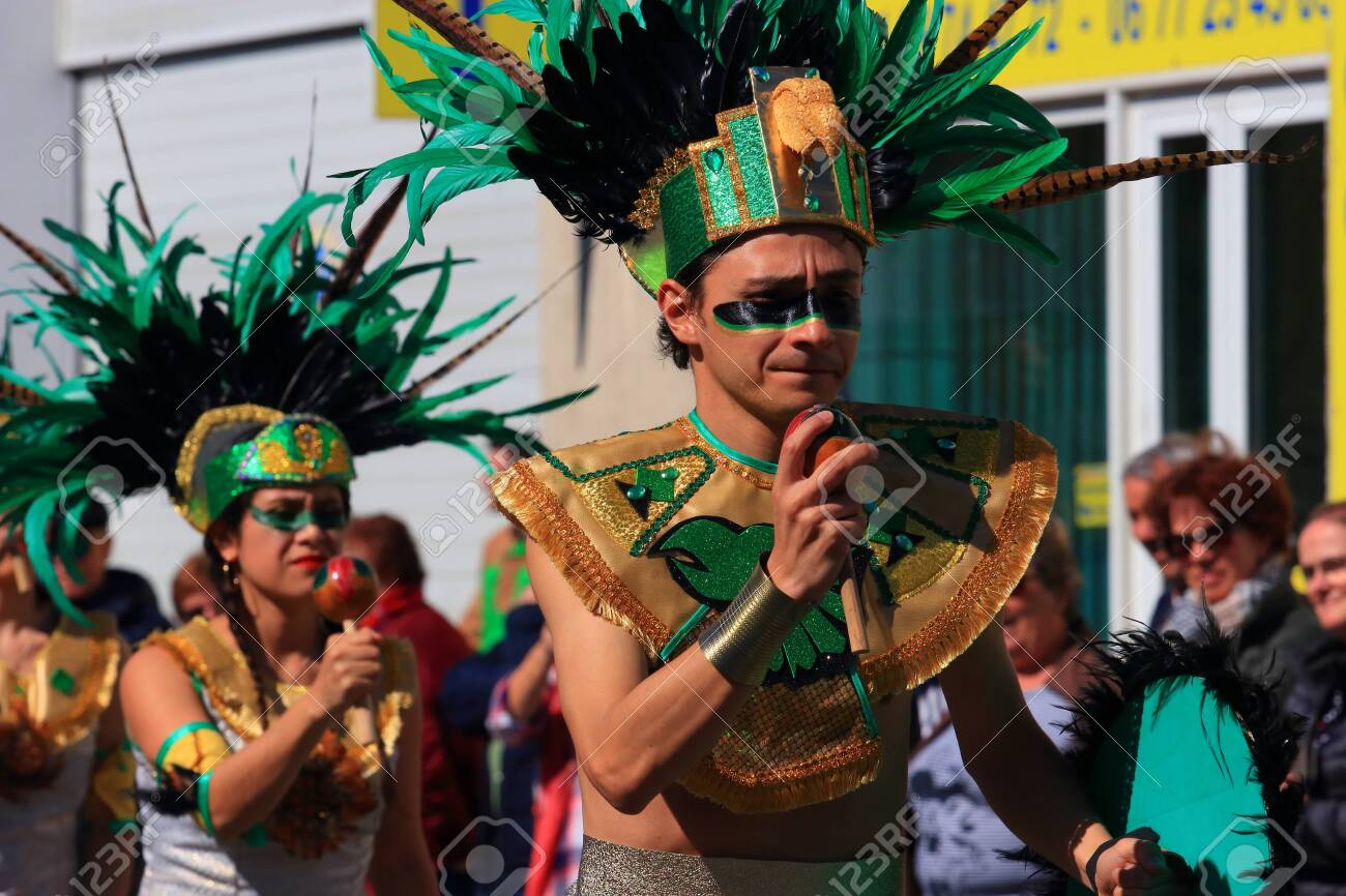 Mexican dancers disguised as Indian at the carnival of Limoux in the Aude, Languedoc in the south of France - 143985306 Mexican dancers disguised as Indian at the carnival of Limoux in the Aude, Languedoc in the south of France - 143985306