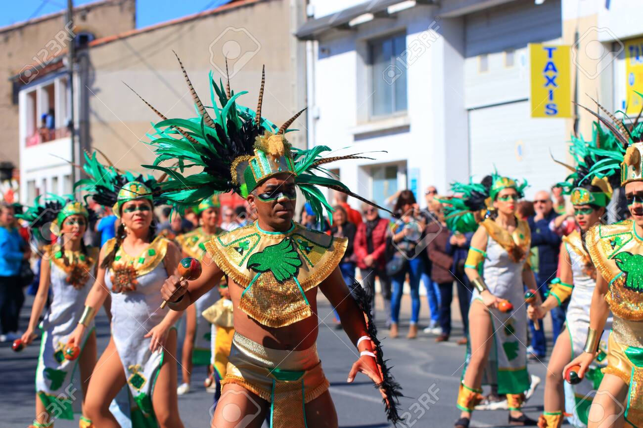 Mexican dancers disguised as Indian at the carnival of Limoux in the Aude, Languedoc in the south of France - 143985312 Mexican dancers disguised as Indian at the carnival of Limoux in the Aude, Languedoc in the south of France - 143985312