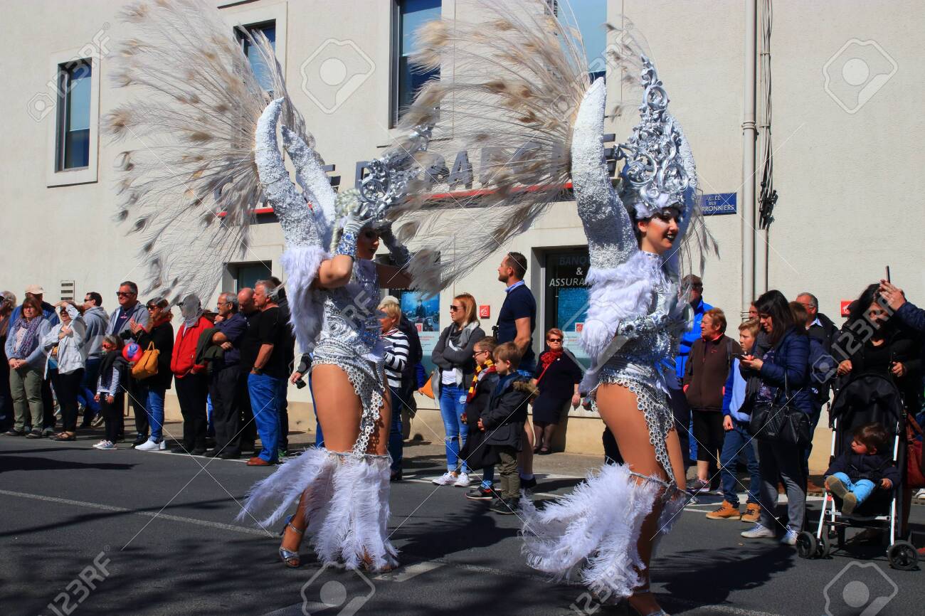 Angels parade at the french carnival of Limoux in Aude, Occitania in the southern of France - 143985482 Angels parade at the french carnival of Limoux in Aude, Occitania in the southern of France - 143985482