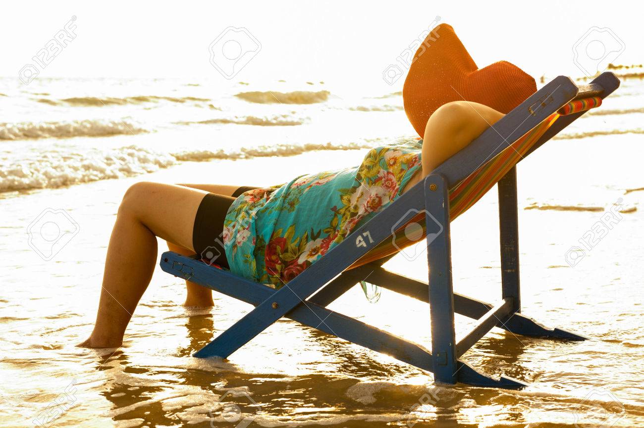 Young Woman Sleeping On The Beach Chair At Sunset Stock Photo Picture And Royalty Free Image Image 32558650