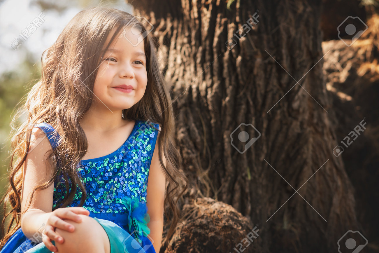 Beautiful Happy Little Girl Playing In The Park In Blue Dress Without Shoes  Laughing Screaming With Happiness In Family Enjoying Children's Day Stock  Photo, Picture and Royalty Free Image. Image 202644593., image size:1300x867