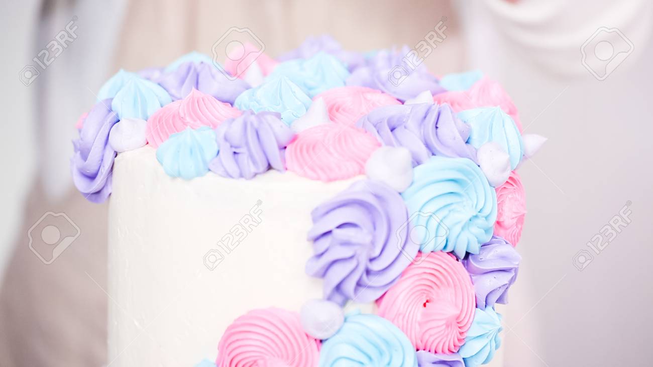 Step By Step Pastry Chef Piping Butter Cream Frosting On Unicorn