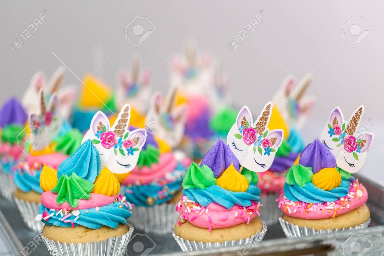 Unicorn Cupcakes With Multicolor Buttercream Icing On Metal Tray