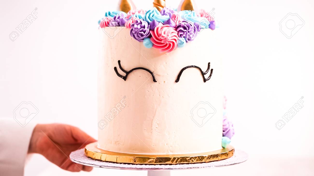 baker decorating a unicorn