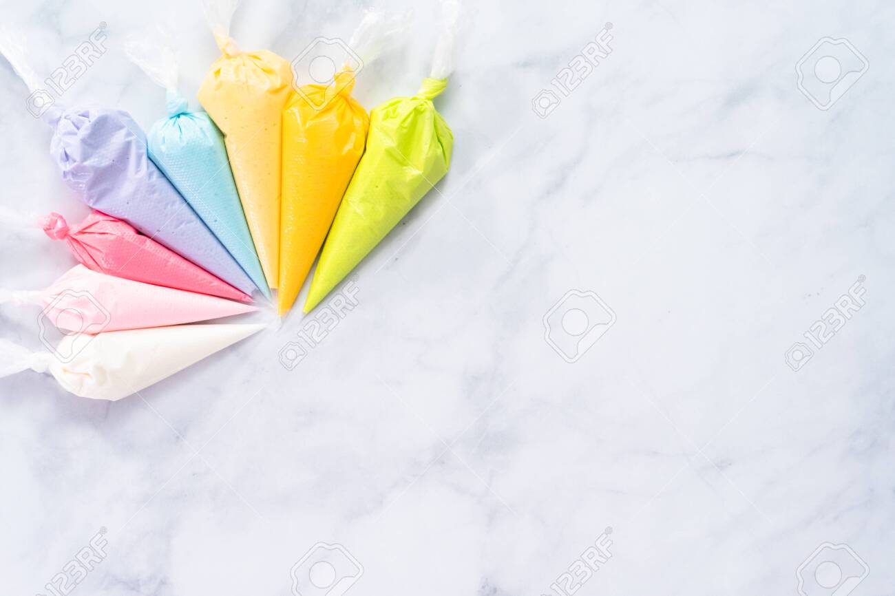Flat Lay Piping Bags With Pastel Color Royal Icing To Decorate Easter Sugar Cookies Stock Photo Picture And Royalty Free Image Image 126953467