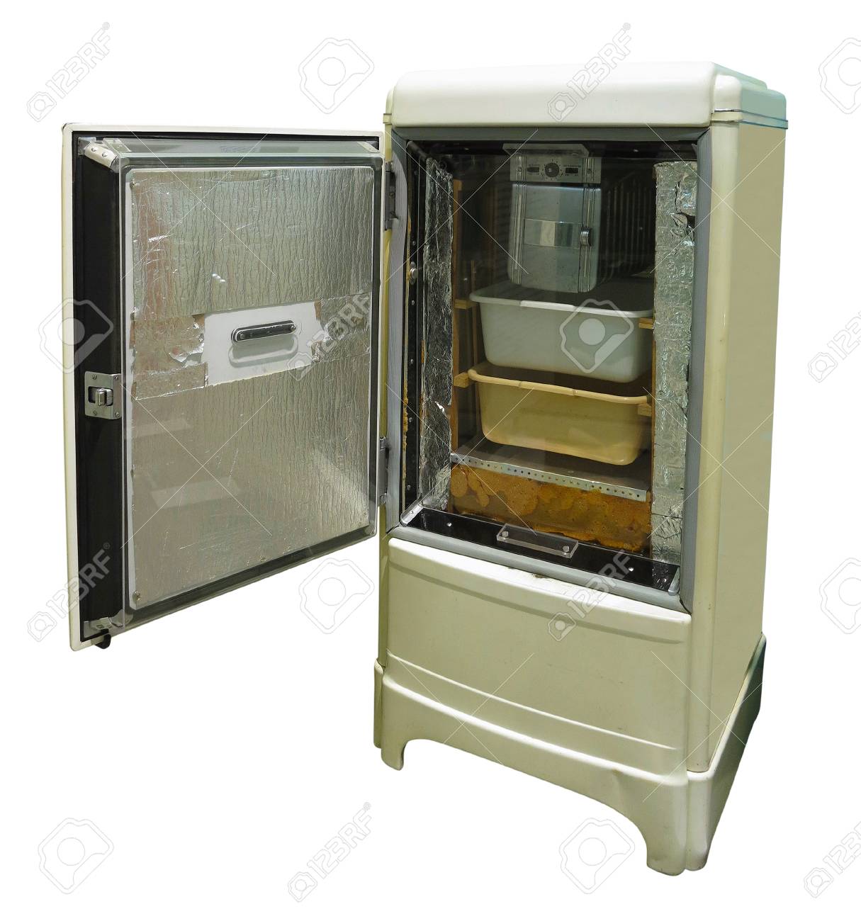 Old refrigerator vintage fridge with chrome handle isolated over..