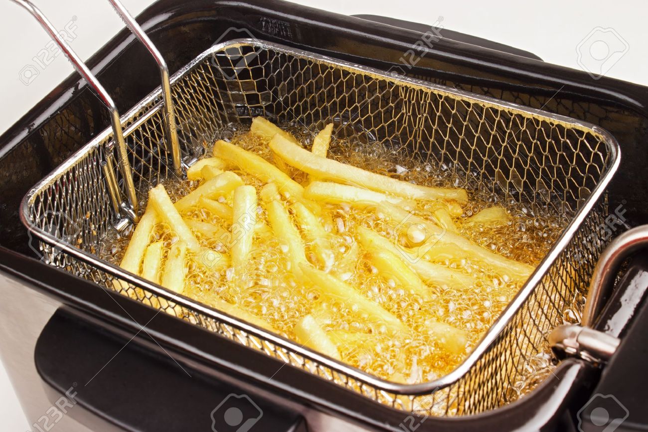 Closeup Of French Fries In Hot Fat In A Deep Fryer Stock Photo Picture And Royalty Free Image Image 20447903