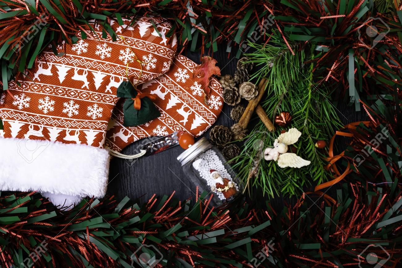 Christmas Socks With Present Gift Berry Garland Santa Claus Stock Photo Picture And Royalty Free Image Image 111033292