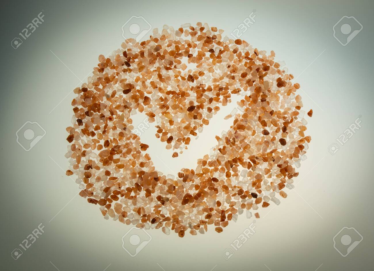 Pink salt on white background. Pink Himalayan salt on white background. Natural Himalayan salt. - 139696829 Pink salt on white background. Pink Himalayan salt on white background. Natural Himalayan salt. - 139696829
