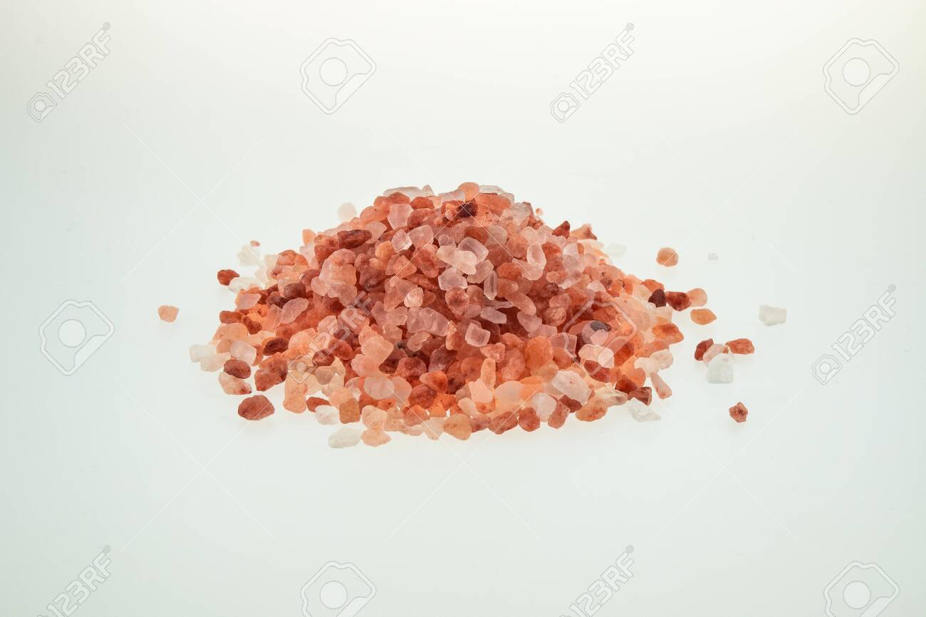 Pink salt on white background. Pink Himalayan salt on white background. Natural Himalayan salt. - 139696835 Pink salt on white background. Pink Himalayan salt on white background. Natural Himalayan salt. - 139696835