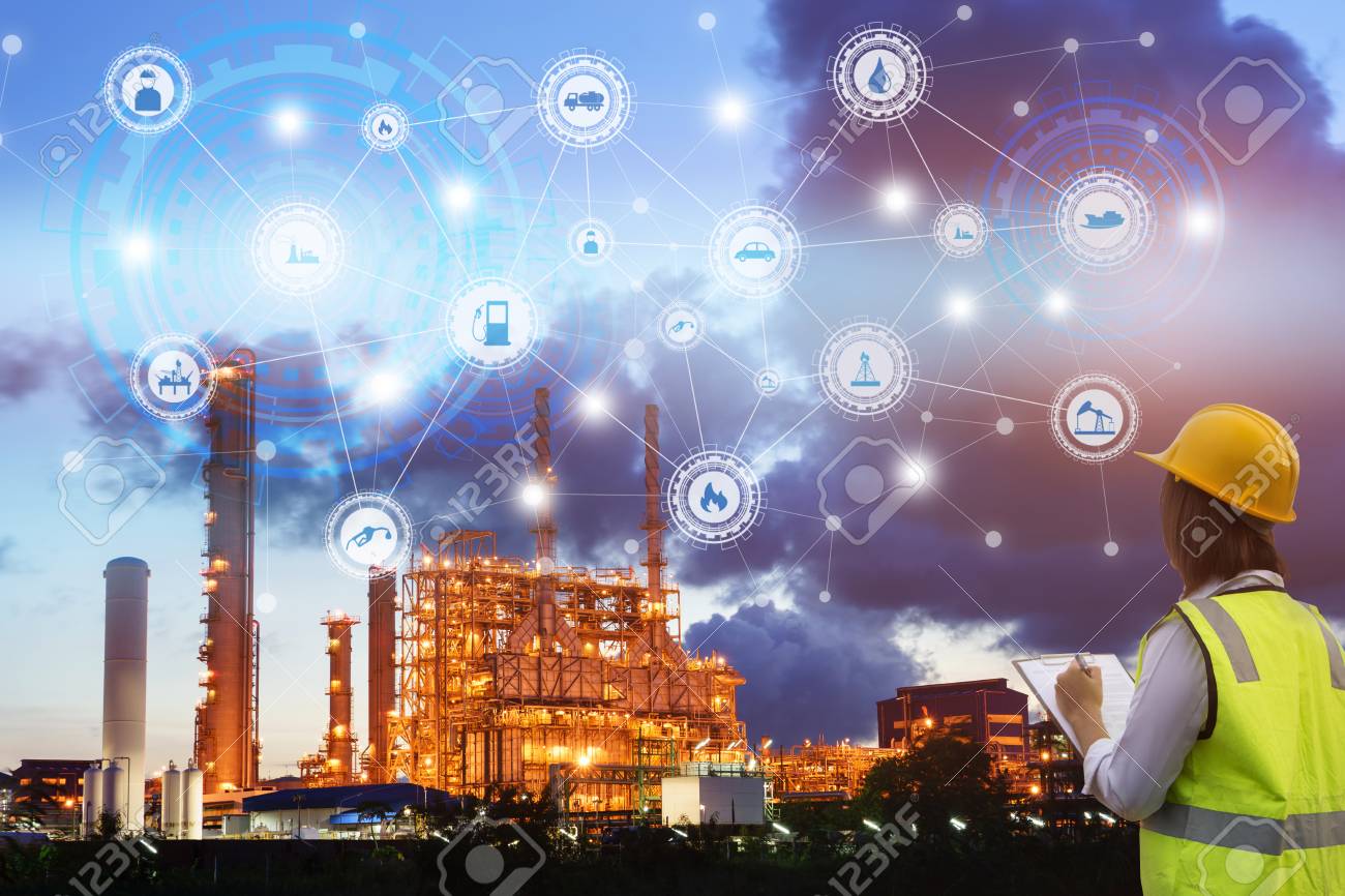 Industry 4.0 concept engineering use clipboard with checking and industrial icons on oil refinery industry sunset background. - 88033755 Industry 4.0 concept engineering use clipboard with checking and industrial icons on oil refinery industry sunset background. - 88033755
