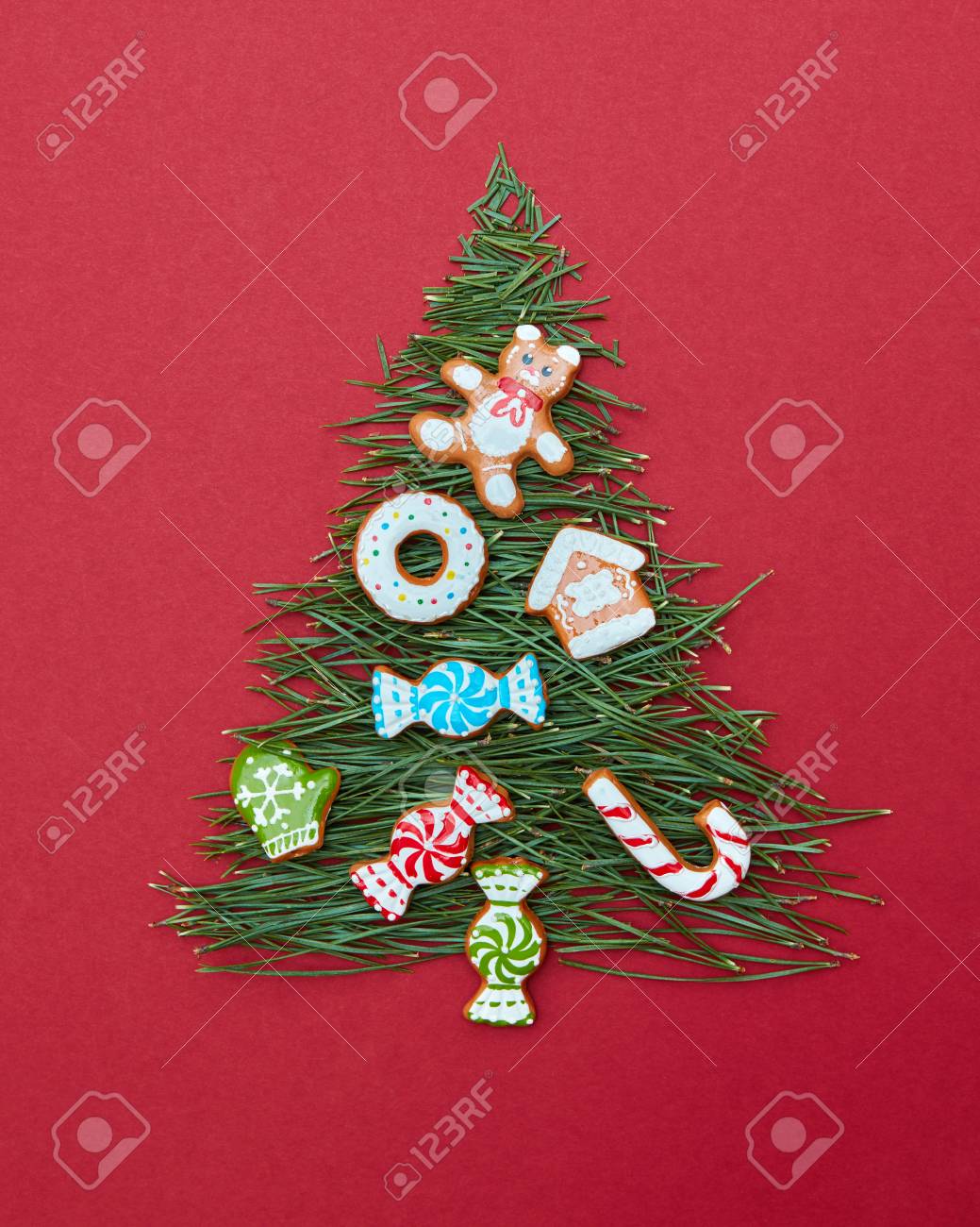 Christmas Cookies Decorated Tree On A Red Background Postcard Happy New Year Stock Christmas Cookies Decorated Tree On A Red Background Postcard Happy New Year Stock