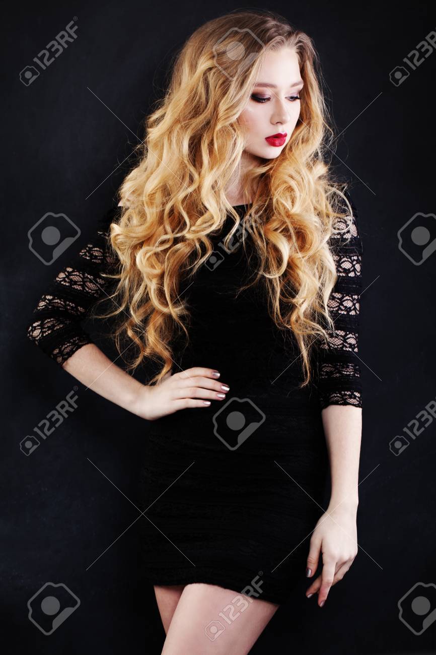 Beautiful Woman With Blonde Curly Hairstyle Wearing Black Dress