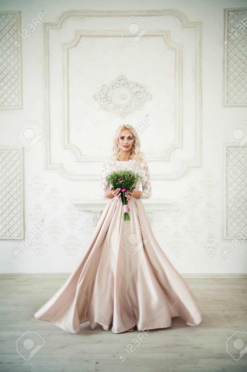 Beautiful Blonde Woman In Pink Evening Gown Smiling Perfect