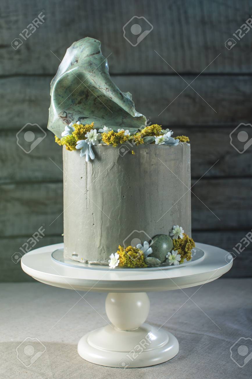 Rustic Style Wedding Cake Decorated With Stone And The Top Of Moss Rustic Style Wedding Cake Decorated With Stone And The Top Of Moss