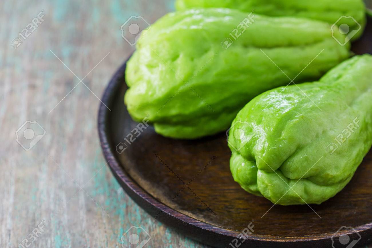 The Chayote Sechium Edule Is A Vegetable On Wooden Background Stock Photo Picture And Royalty Free Image Image 35127820