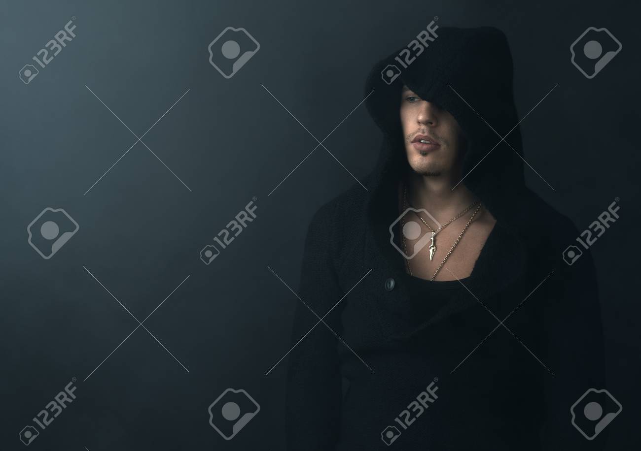 man in a black hoodie
