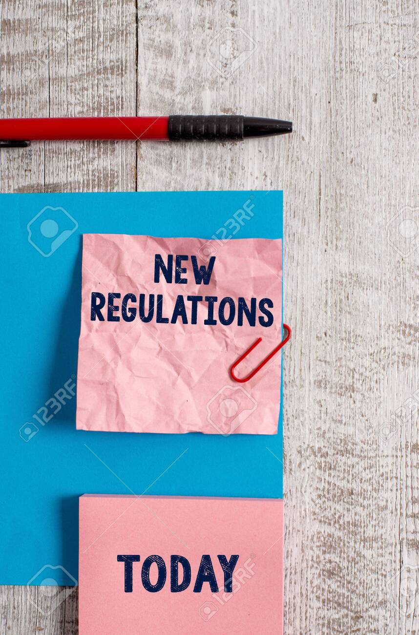 Word writing text New Regulations. Business photo showcasing Regulation controlling the activity usually used by rules. Wrinkle paper and cardboard plus stationary placed above wooden background - 126246052 Word writing text New Regulations. Business photo showcasing Regulation controlling the activity usually used by rules. Wrinkle paper and cardboard plus stationary placed above wooden background - 126246052