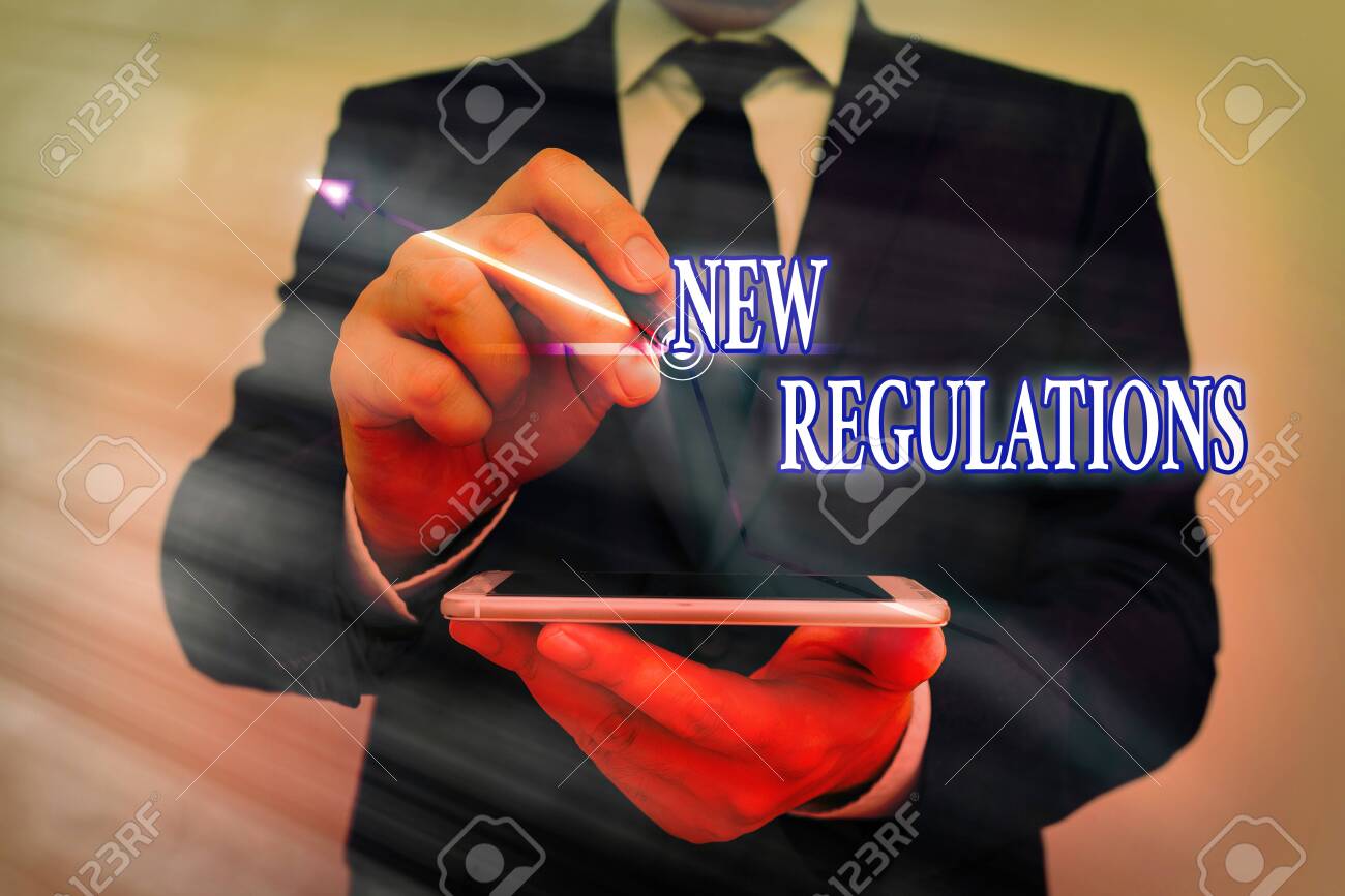 Text sign showing New Regulations. Business photo text Regulation controlling the activity usually used by rules. - 146599145 Text sign showing New Regulations. Business photo text Regulation controlling the activity usually used by rules. - 146599145