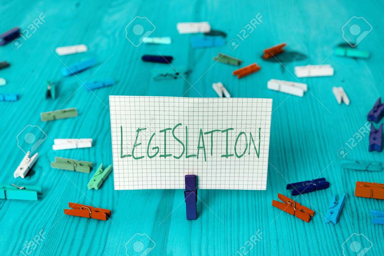 Conceptual hand writing showing Legislation. Concept meaning the exercise of the power and function of making rules Colored crumpled rectangle shape paper light blue background - 153418459 Conceptual hand writing showing Legislation. Concept meaning the exercise of the power and function of making rules Colored crumpled rectangle shape paper light blue background - 153418459