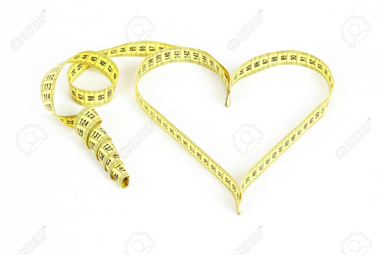 A measuring tape shaping a heart isolated on white background - 17934498 A measuring tape shaping a heart isolated on white background - 17934498