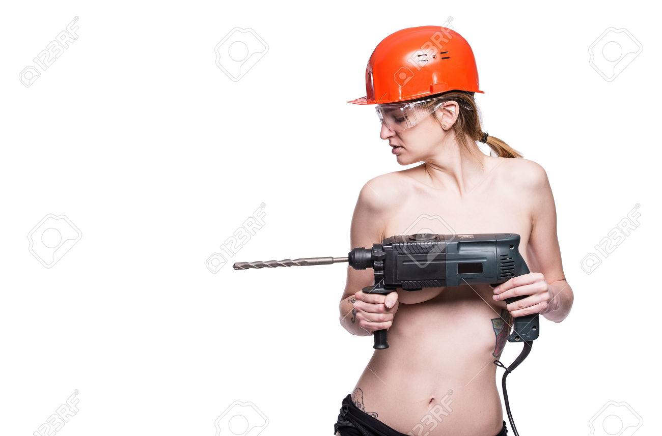 Young Sexy Nude Woman Holding A Construction Drill. Seductive Female  Builder Worker In Hard Hat And Construction Glasses. Isolated On White  Background. Copy Space Stock Photo, Picture and Royalty Free Image. Image