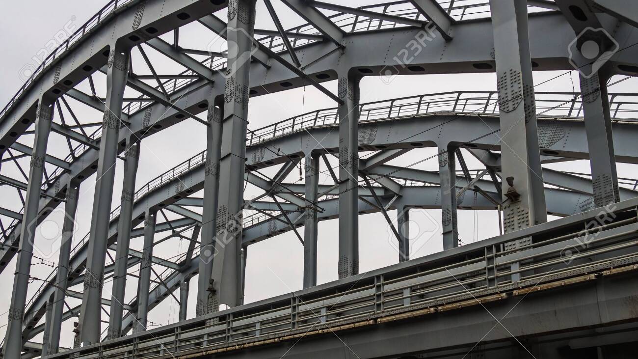 Poetry of metal structures of St. Petersburg. View of American bridges from the sidewalk. - 142252709 Poetry of metal structures of St. Petersburg. View of American bridges from the sidewalk. - 142252709
