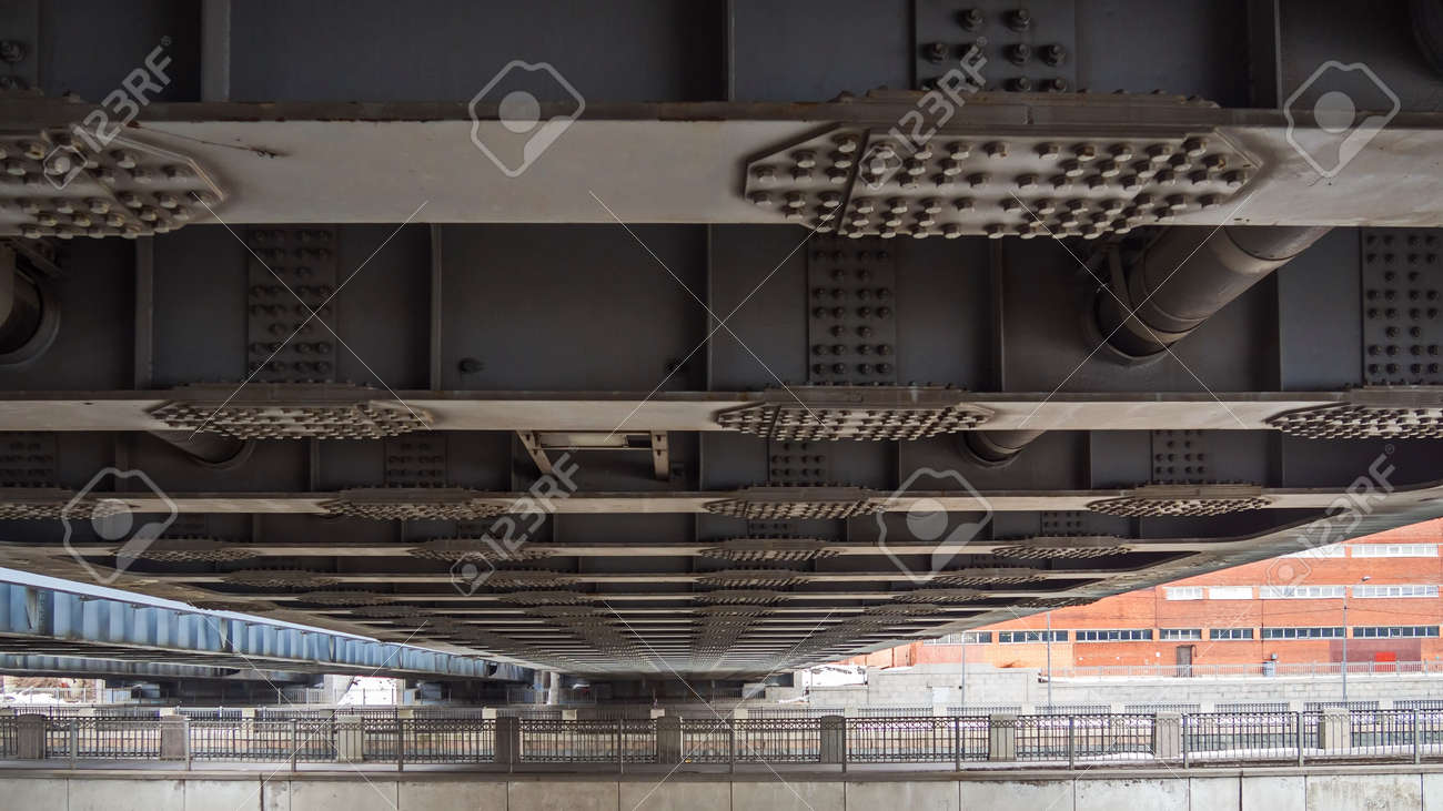 Poetry of metal structures of St. Petersburg. View of American bridges from the sidewalk. - 118779434 Poetry of metal structures of St. Petersburg. View of American bridges from the sidewalk. - 118779434