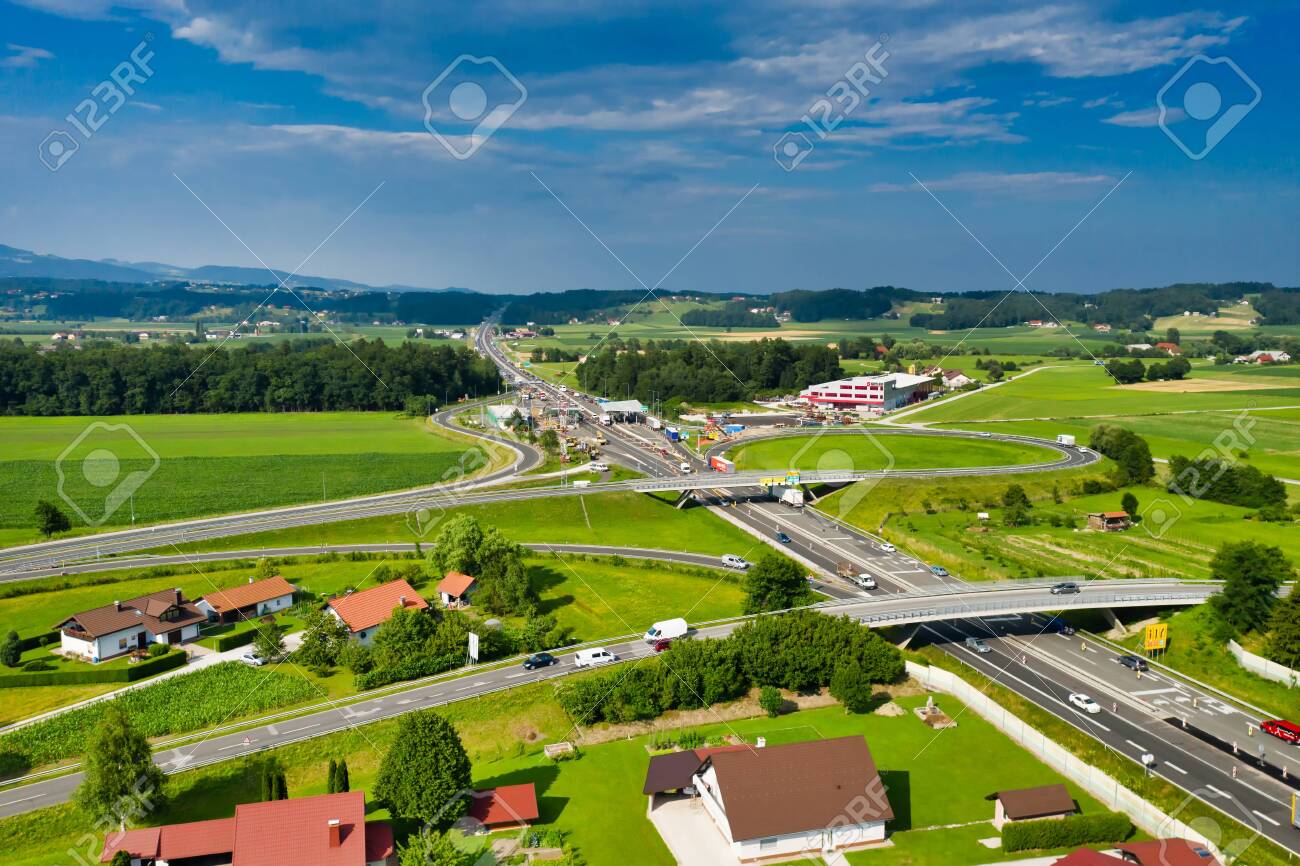 Slovenske Konjice, Slovenia - June 16 2019: Aerial view of construction works on Tepanje toll station on A1 highway in Slovenia. Toll stations are removed due introduction of electronic toll payment - 137009934 Slovenske Konjice, Slovenia - June 16 2019: Aerial view of construction works on Tepanje toll station on A1 highway in Slovenia. Toll stations are removed due introduction of electronic toll payment - 137009934
