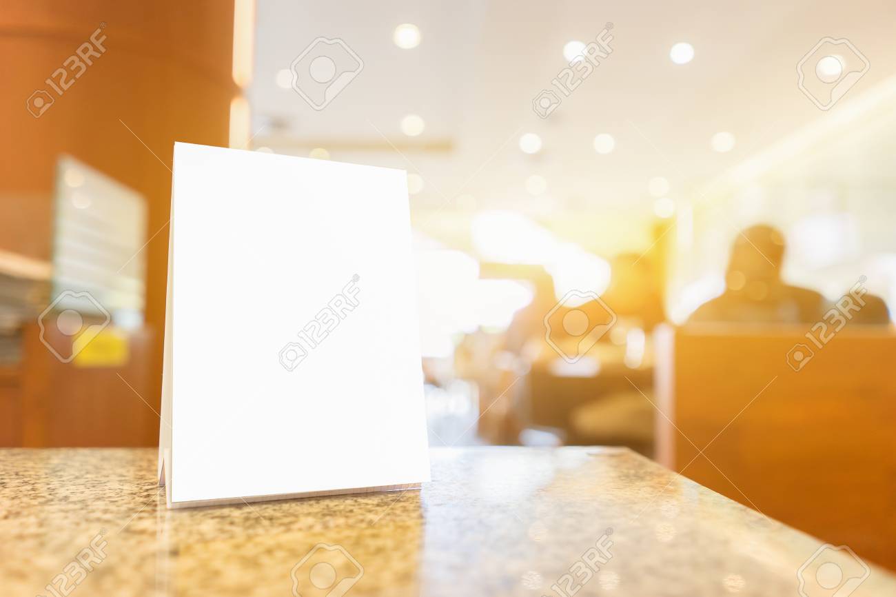 mock up menu frame on table in bar restaurant stand for booklets restaurant order booklets