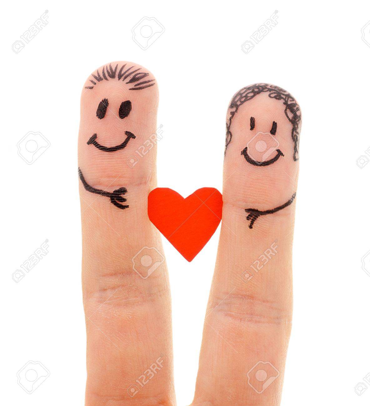 A happy couple in love with painted smiley and hugging isolated on white background - 13023743 A happy couple in love with painted smiley and hugging isolated on white background - 13023743