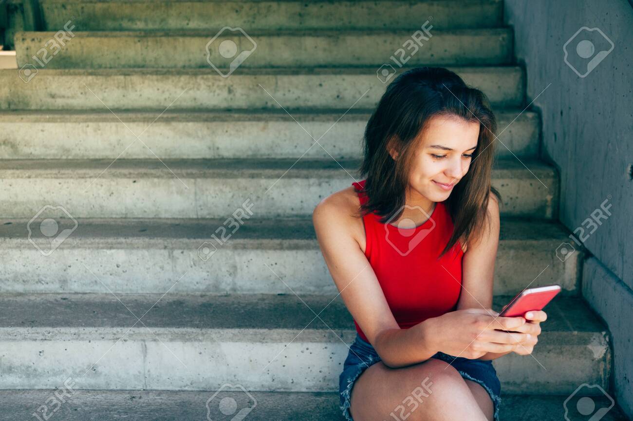 denim skirt and red top