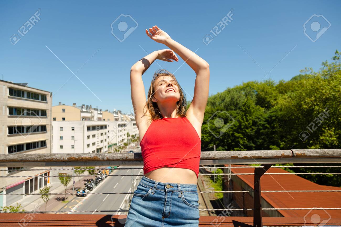 red top and denim skirt