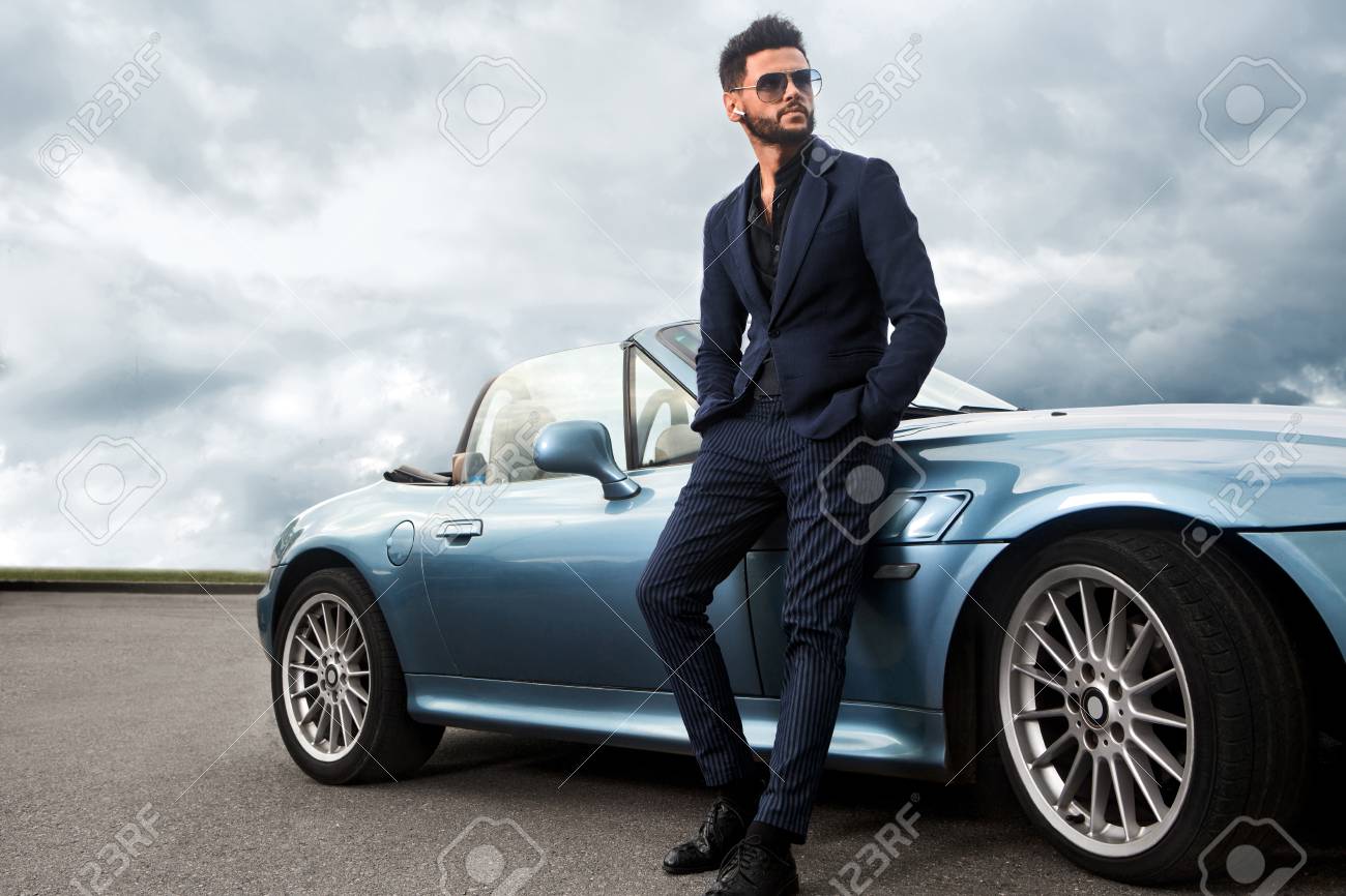 Successful, handsome man near the car. - 118940364 Successful, handsome man near the car. - 118940364