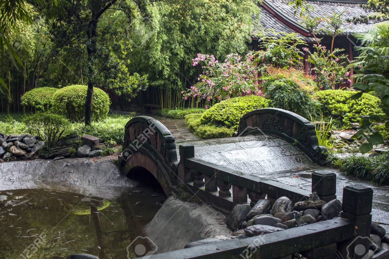 Stone Bridge In A Chinese Garden Traditional Garden Design With Stock Photo Picture And Royalty Free Image Image 110239561
