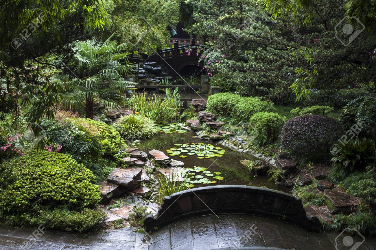 Stone Bridges In A Chinese Garden Traditional Garden Design Stock Photo Picture And Royalty Free Image Image 110239562