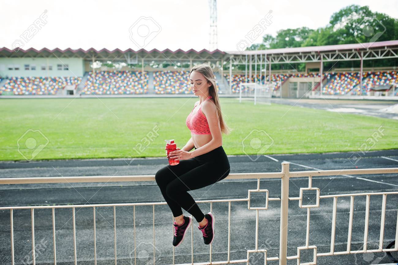 Download Fitness Sporty Girl In Sportswear At Stadium Happy Sexy Woman Stock Photo Picture And Royalty Free Image Image 87424689