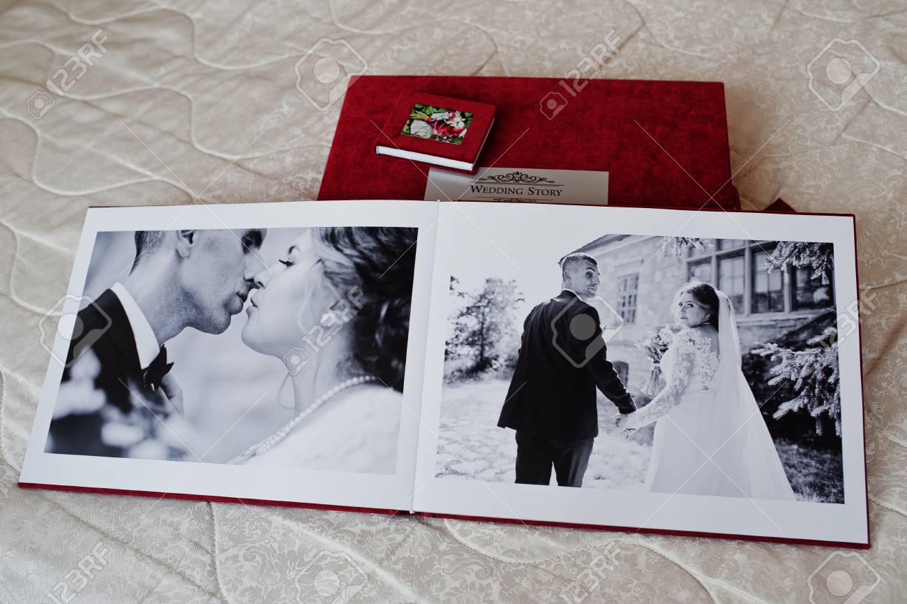 pages of red wedding photobook or wedding album on white background white wedding photo album