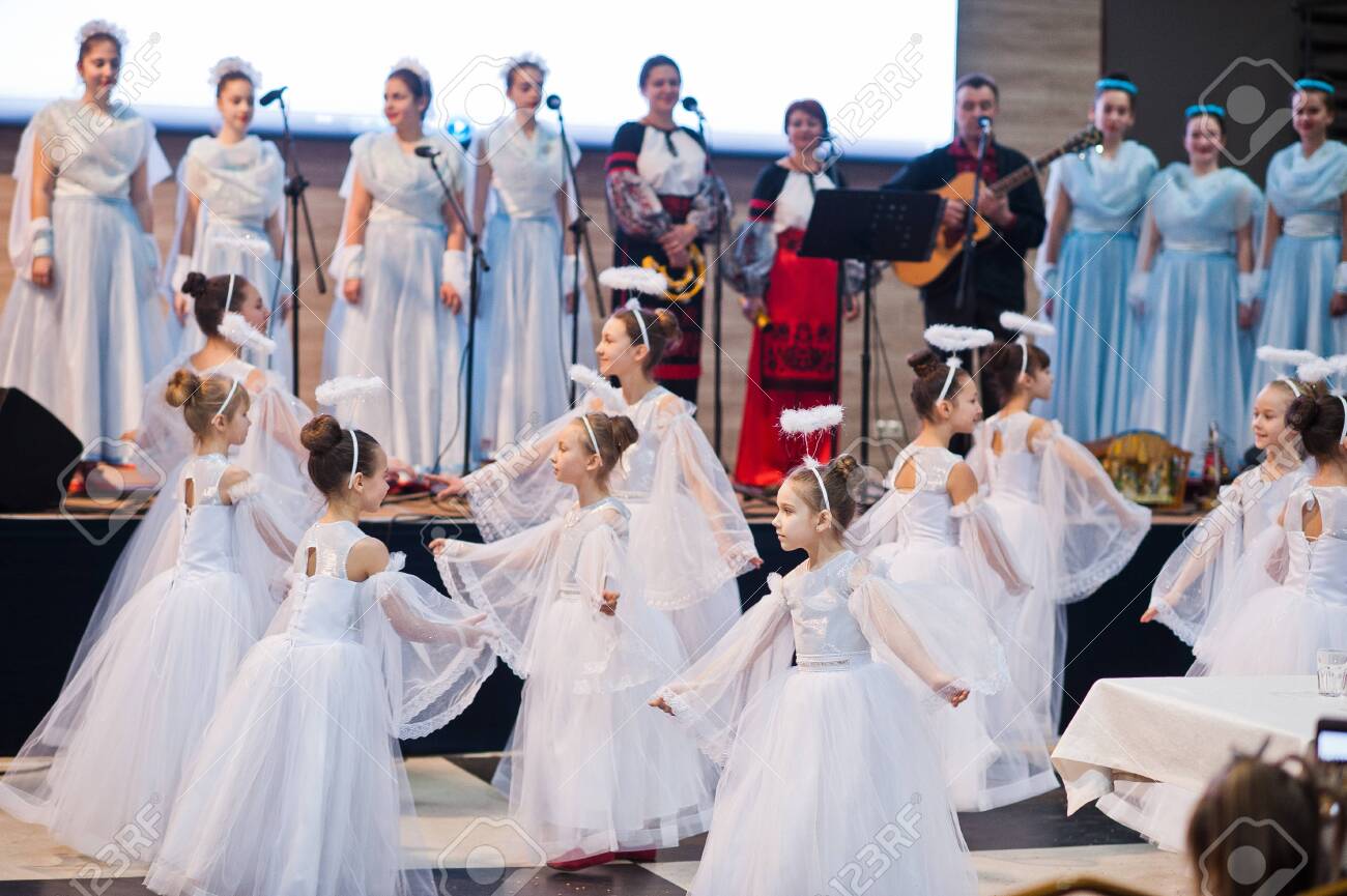 Kyiv, Ukraine - September 1, 2019: Childrens angels in white dresses at Christmas event. - 138123493 Kyiv, Ukraine - September 1, 2019: Childrens angels in white dresses at Christmas event. - 138123493