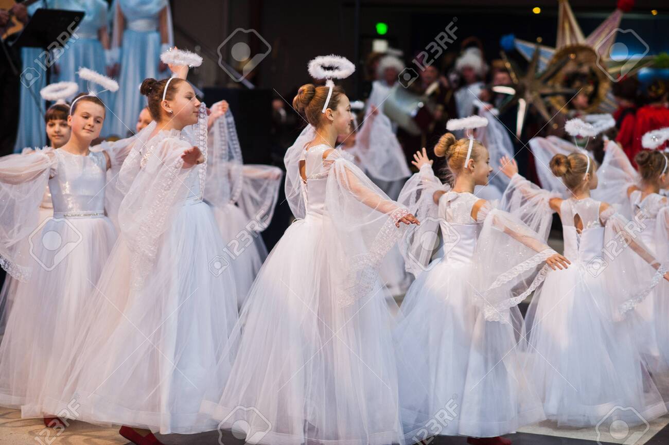 Kyiv, Ukraine - September 1, 2019: Childrens angels in white dresses at Christmas event. - 138123495 Kyiv, Ukraine - September 1, 2019: Childrens angels in white dresses at Christmas event. - 138123495