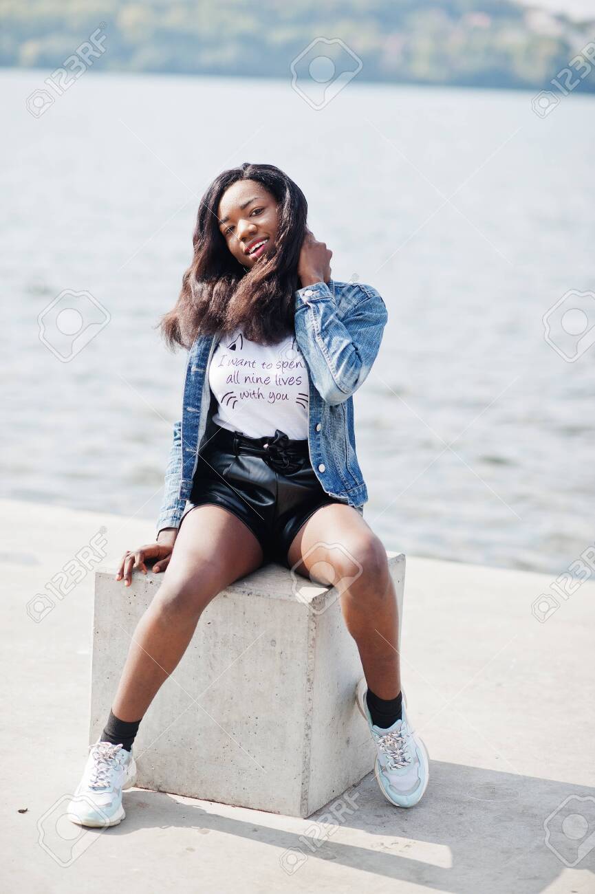 denim jacket with black shorts