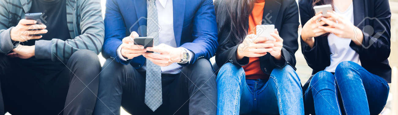 Group of business people use technology together of smartphone - 168607156 Group of business people use technology together of smartphone - 168607156