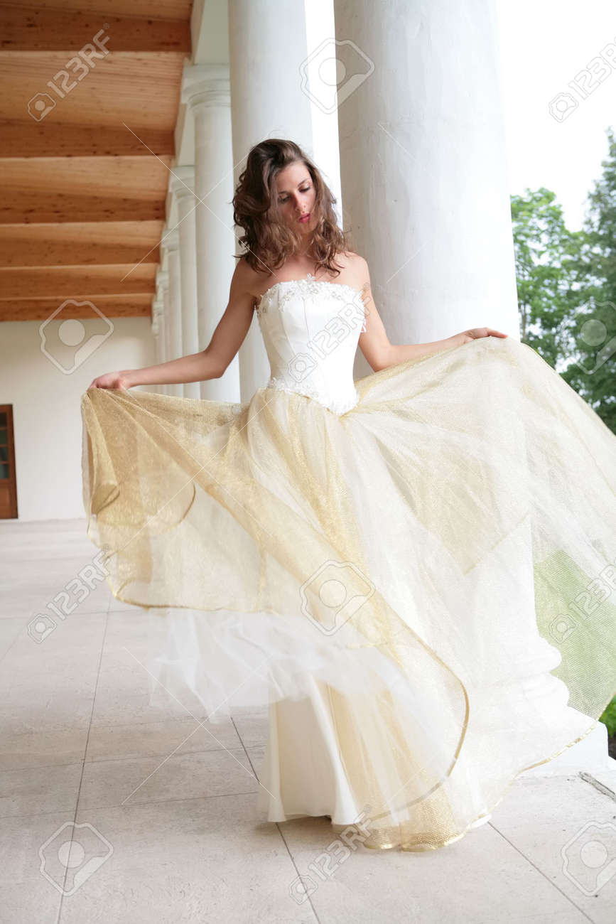 white golden gown