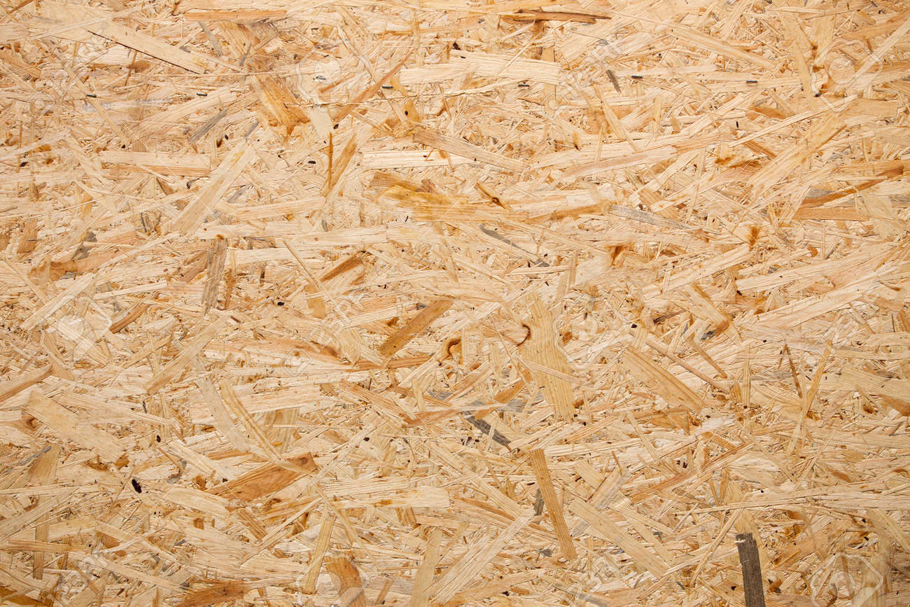 yellow wood chipboard can be used as a background stock photo