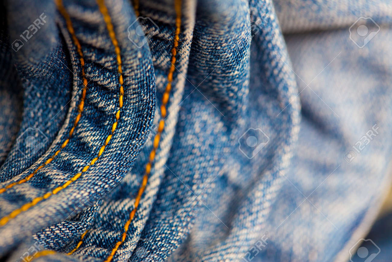 blue jeans with yellow stitching
