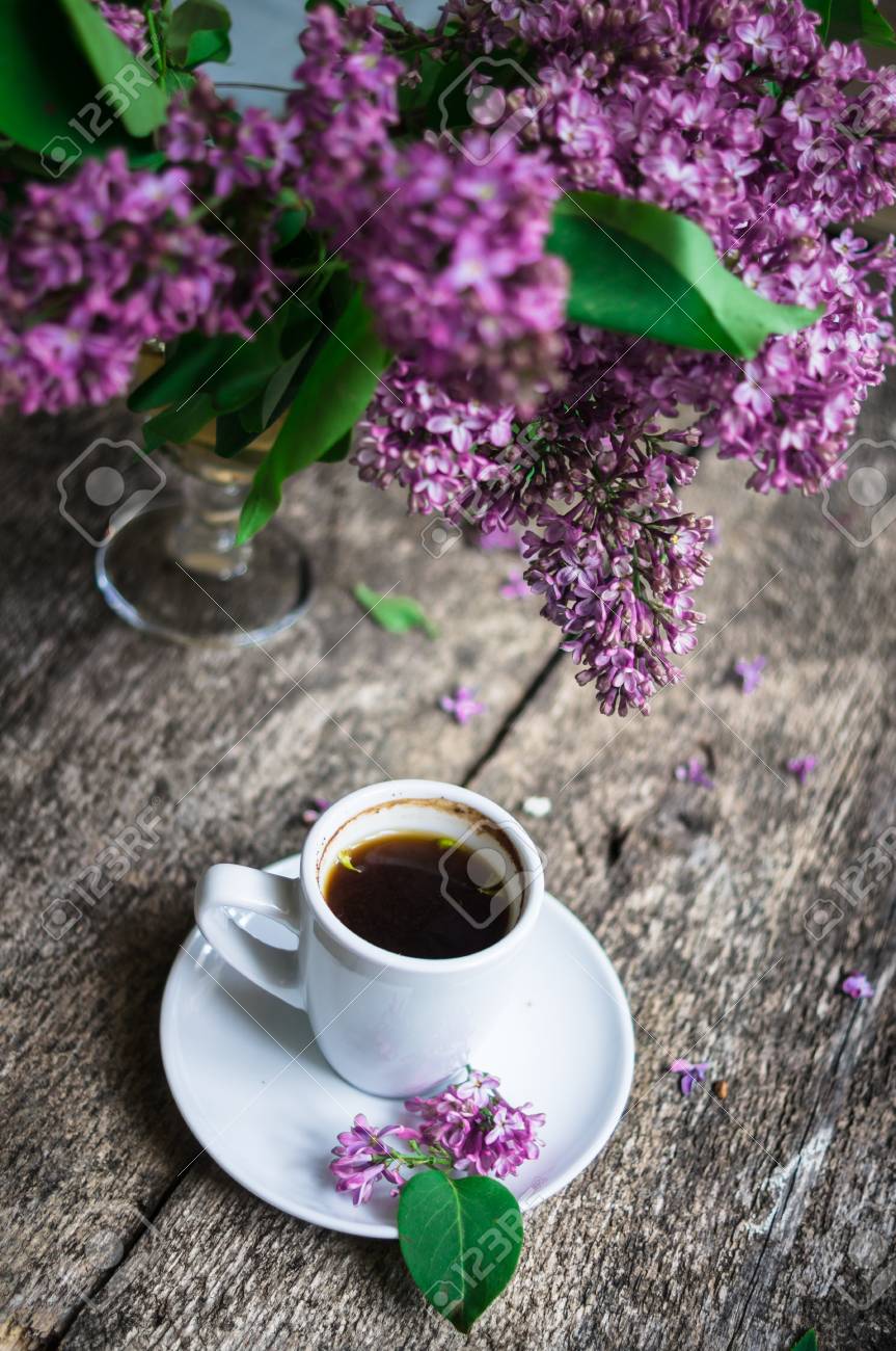 Lilac Flowers In A Vase And Cup Of Coffee On The Rustic Style Stock Photo Picture And Royalty Free Image Image 38588337